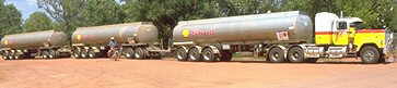 Roadtrain and cyclist