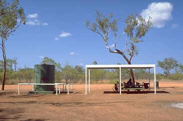 roadside stop with emergency-water tank on Stuart Highway.