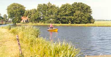 crossing a river by rowingboat crossing a river by rowingboat