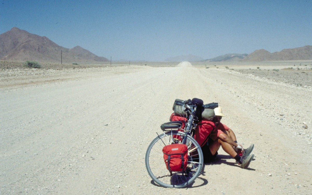 on a hot day, break in the shade of the bike