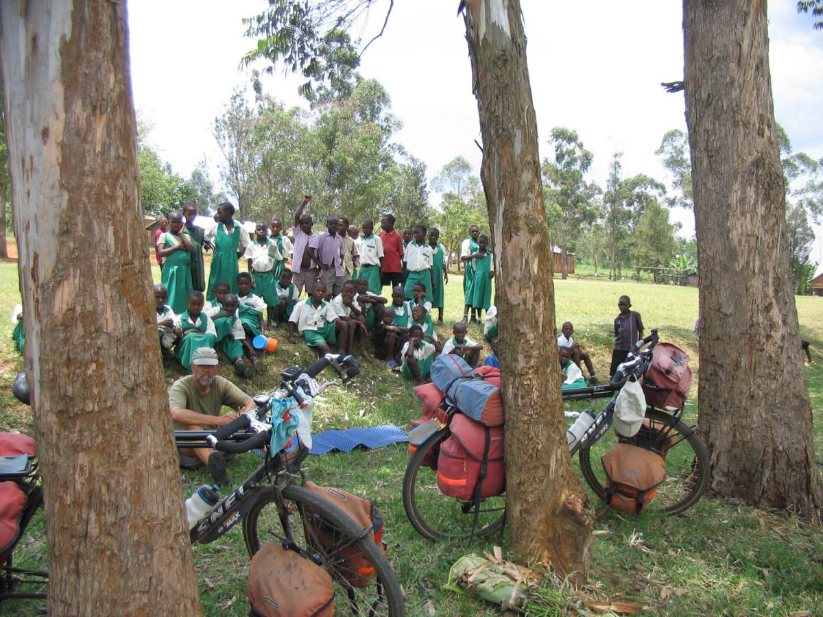 curious kids gathering around the wazungu